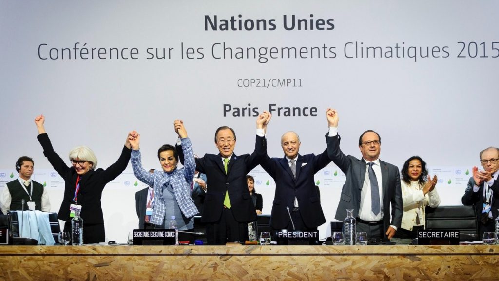 Personer som firar Parisavtalet